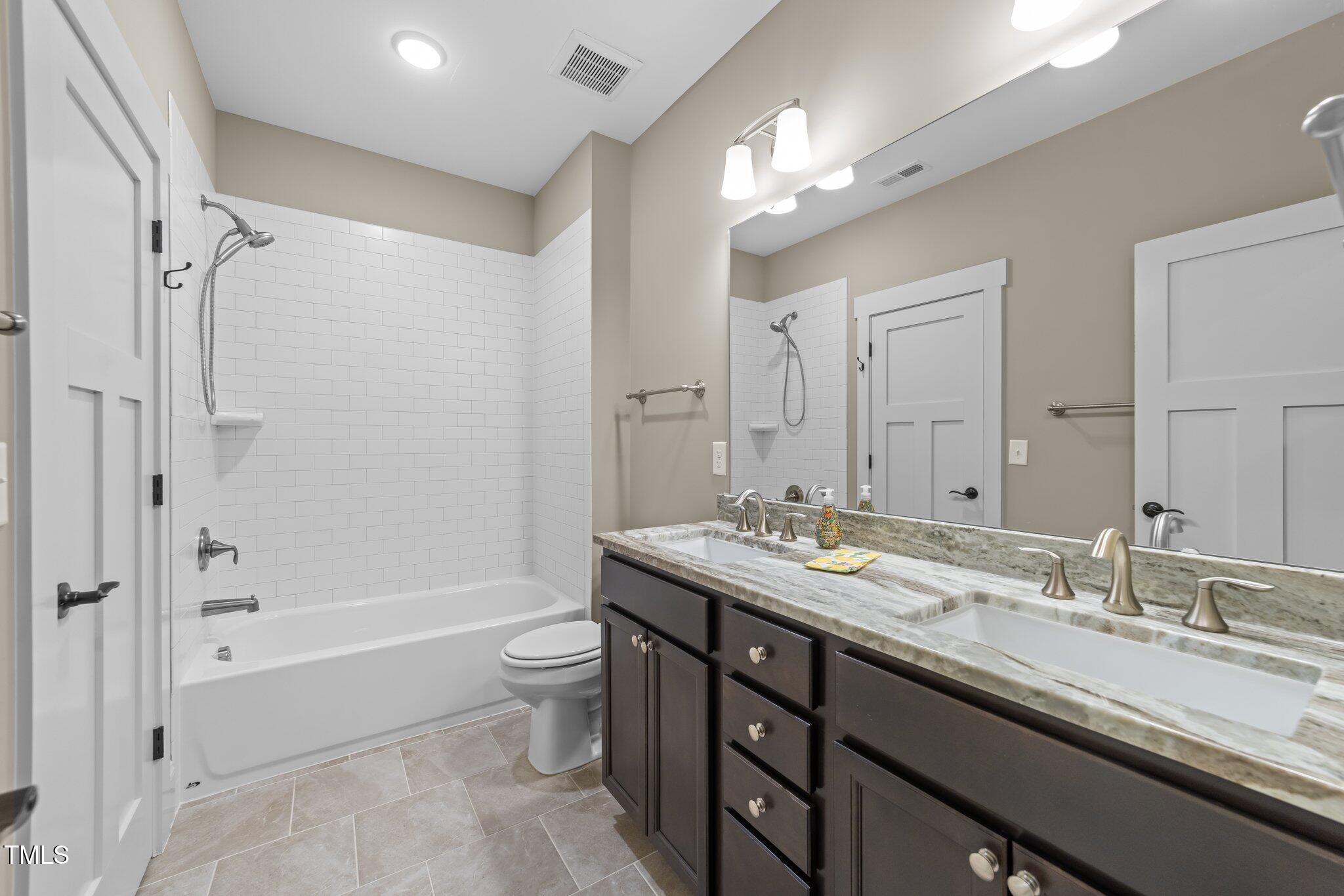 4924 Theys Road Raleigh, NC 27606 - Photo 50 of 74 Guest bathroom