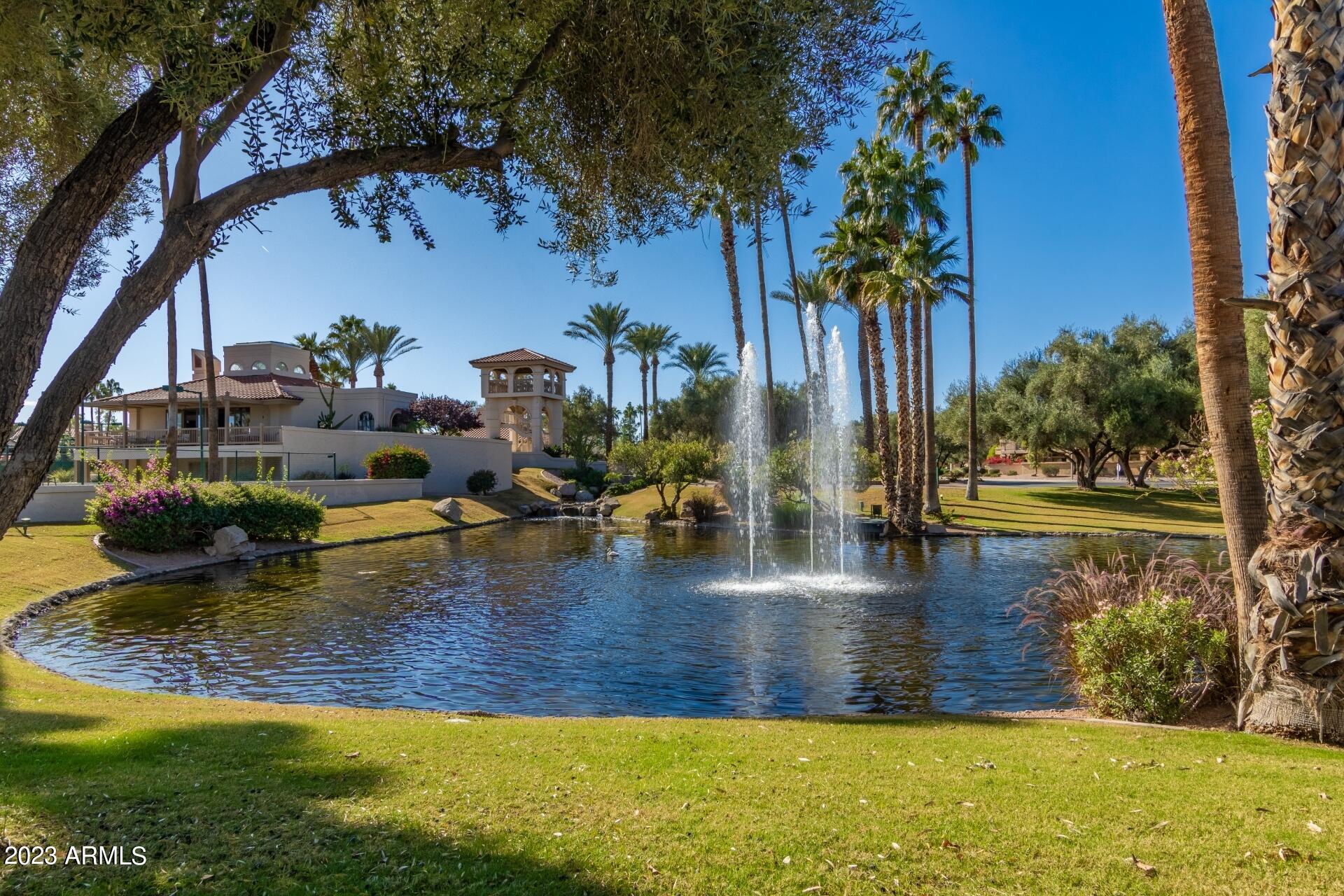 9711 East Mountain View Road, Unit 1502 Scottsdale, AZ 85258 - Photo 30 of 43 a view of a swimming pool with an outdoor space