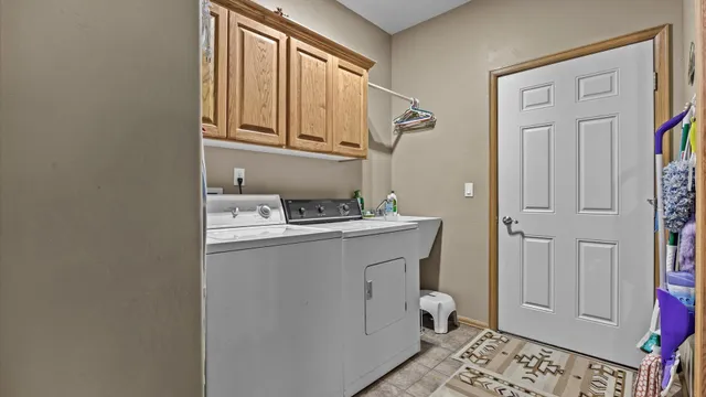 a view of a house with backyard porch and sitting area