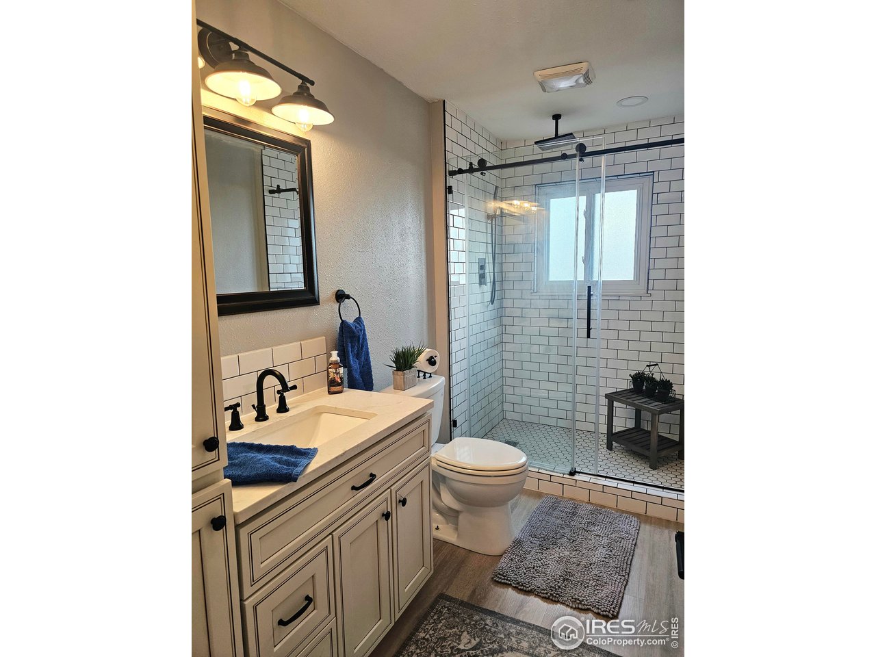 511 Pawnee Drive Sterling, CO 80751 - Photo 29 of 50 3/4 bath on ground level down the hall from the interior garage door