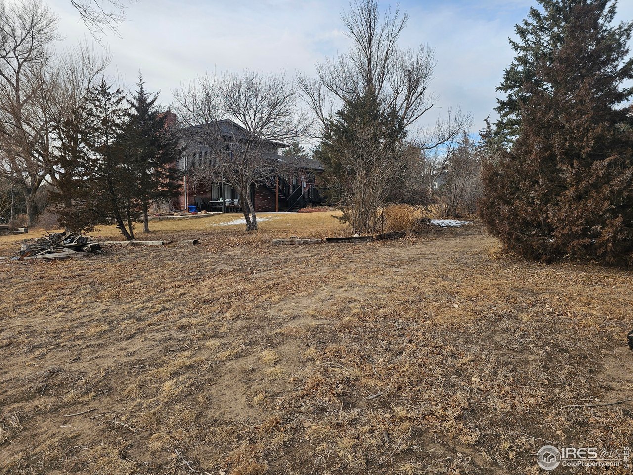 511 Pawnee Drive Sterling, CO 80751 - Photo 40 of 50 View from the east edge of the property looking west toward the back of the house