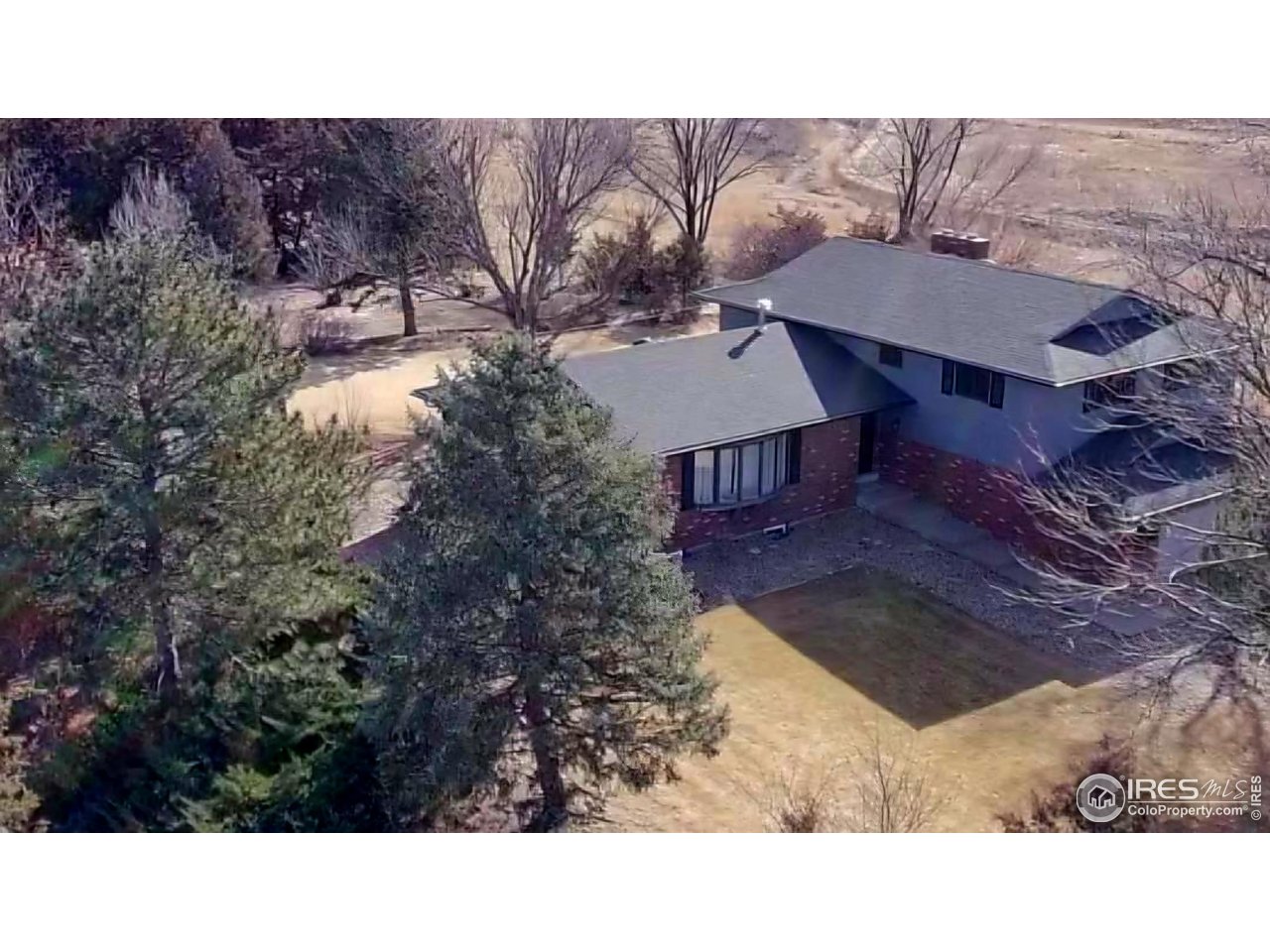 511 Pawnee Drive Sterling, CO 80751 - Photo 44 of 50 Aerial view of home from the northwest corner of the property