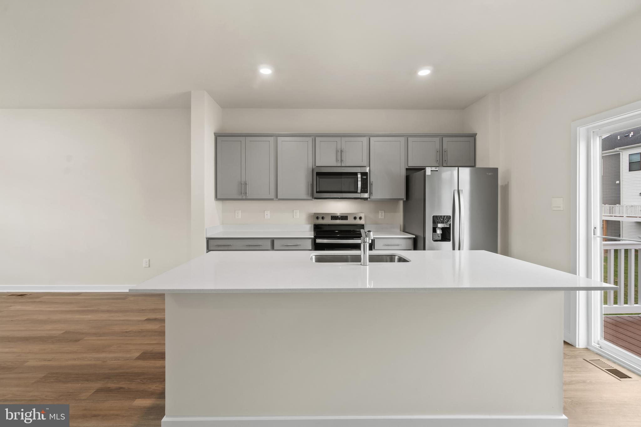 238 Soft Rush Lane La Plata, MD 20646 - Photo 13 of 33 a kitchen with stainless steel appliances a refrigerator and a stove