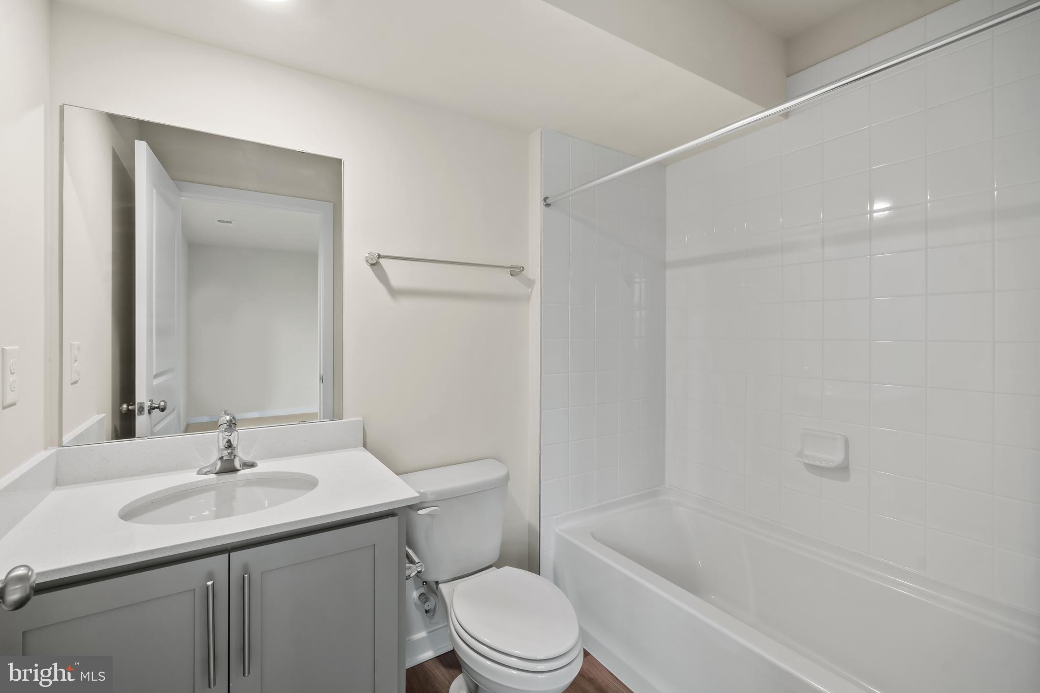 238 Soft Rush Lane La Plata, MD 20646 - Photo 22 of 33 a bathroom with a sink toilet and shower