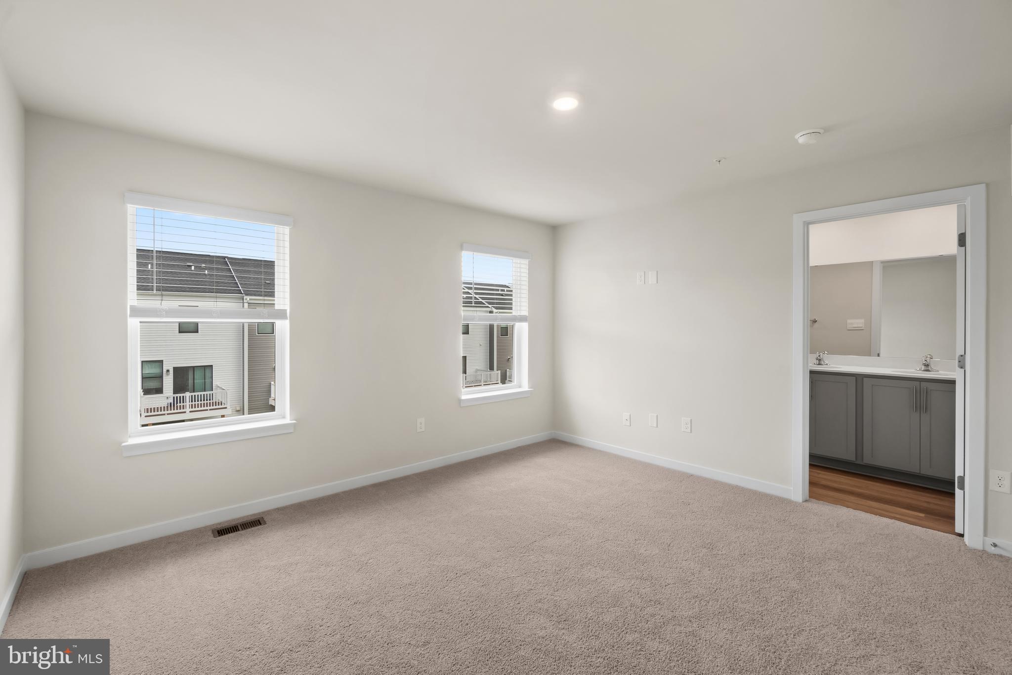 238 Soft Rush Lane La Plata, MD 20646 - Photo 26 of 33 an empty room with a window and a bathroom