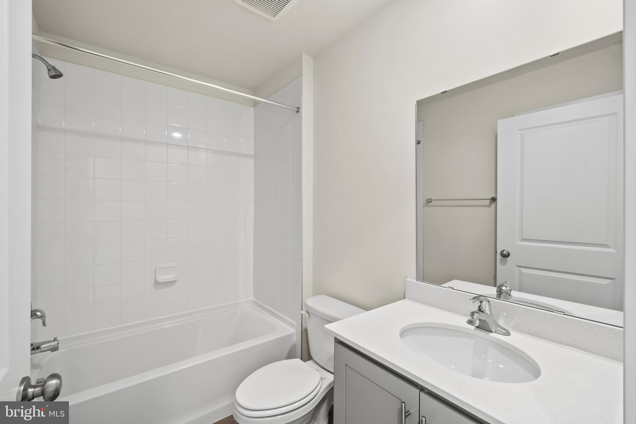 238 Soft Rush Lane La Plata, MD 20646 - Photo 7 of 33 a bathroom with a granite countertop sink toilet and shower