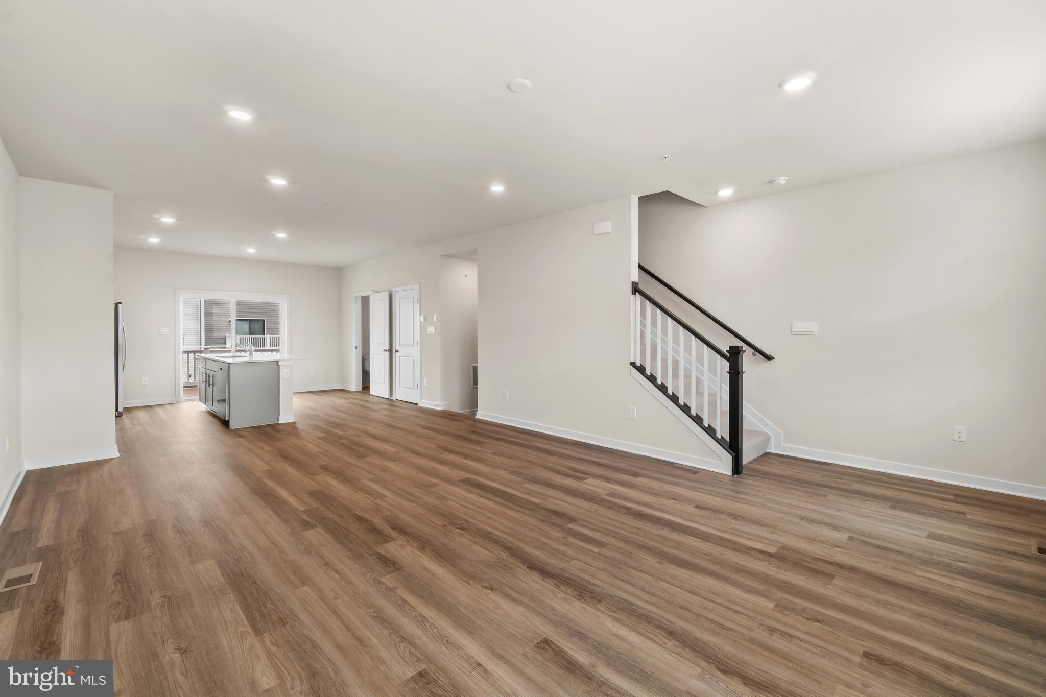 238 Soft Rush Lane La Plata, MD 20646 - Photo 8 of 33 a view of empty room with wooden floor