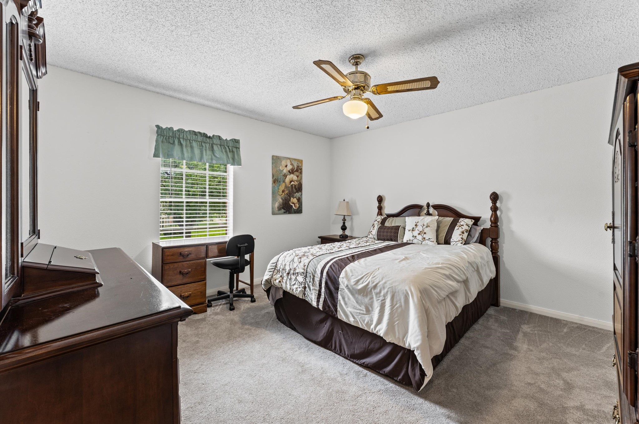9903 Burntfork Street Houston, TX 77064 - Photo 18 of 25 One of three generous sized secondary bedrooms.