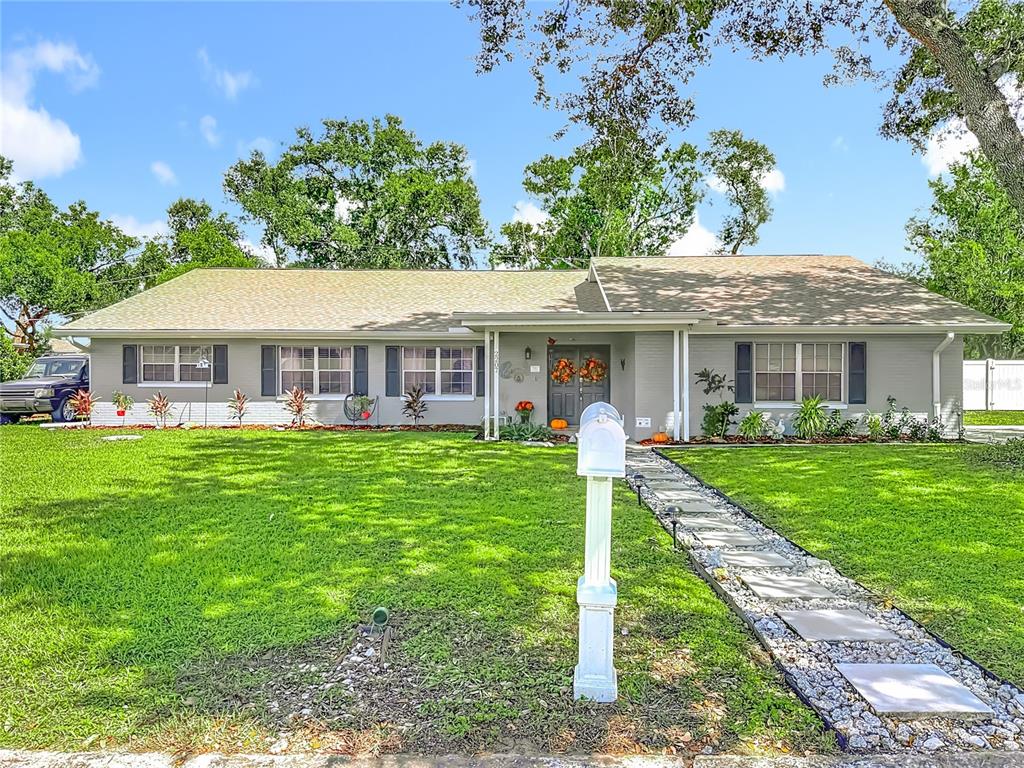 2207 Princess Way Brandon, FL 33511 - Photo 1 of 1 a view of a house with a yard