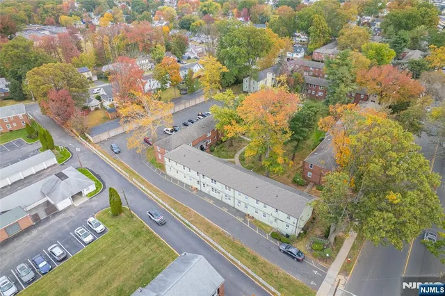 a view of a yard with an outdoor seating
