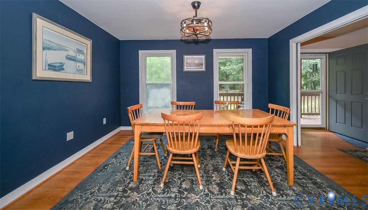 Hardwood flooring, painted walls, white trim, rece