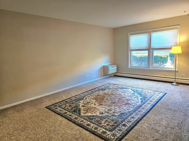 a view of an empty room and window