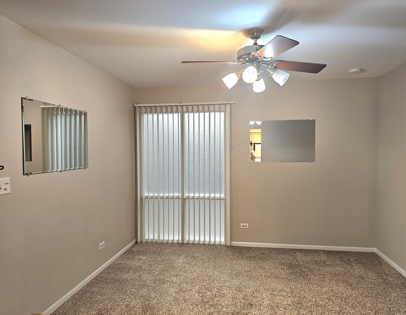 350 Brainerd Avenue, Unit 7A Libertyville, IL 60048 - Photo 5 of 9 a view of an empty room with a window