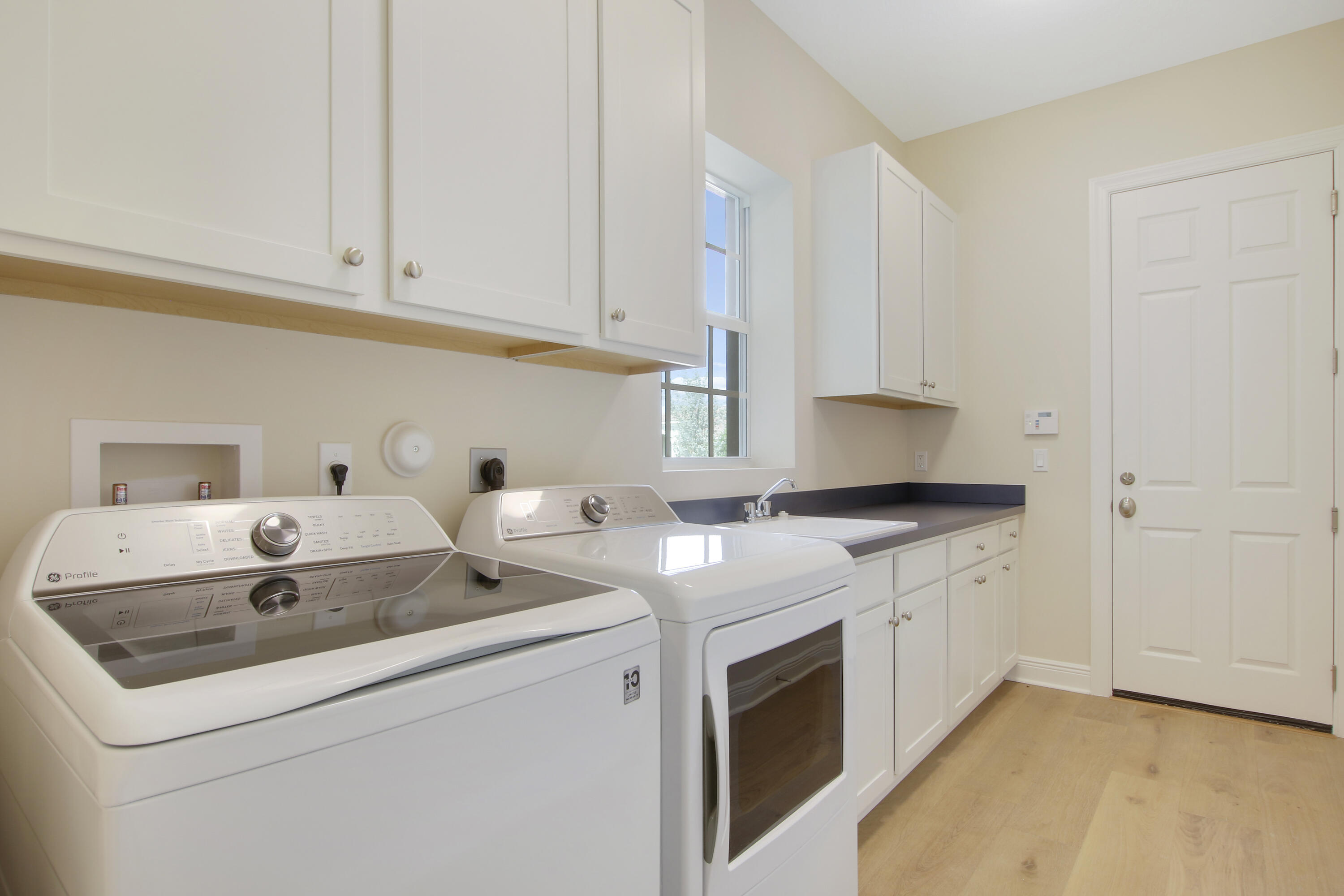 9039 Southwest Roccia Way Port St. Lucie, FL 34987 - Photo 33 of 80 Laundry