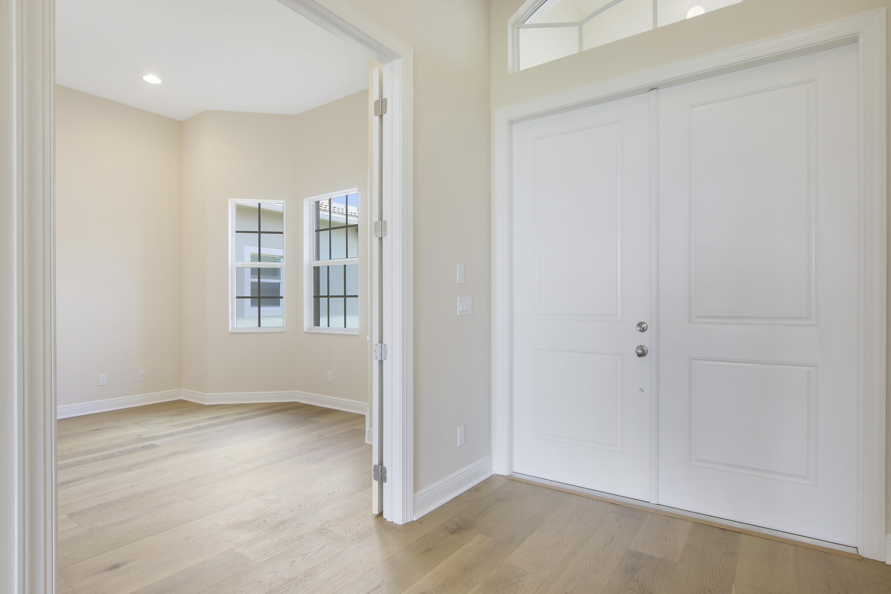 9039 Southwest Roccia Way Port St. Lucie, FL 34987 - Photo 6 of 80 Foyer to Den