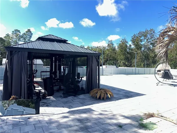 a view of a terrace with sitting area