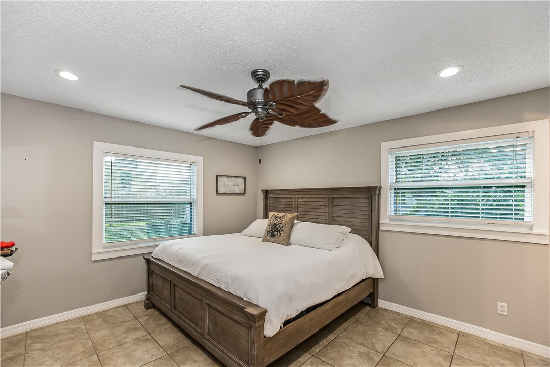 762 Bayharbor Terrace Sebastian, FL 32958 - Photo 11 of 24 a bedroom with a bed and a window