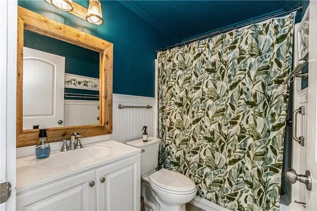 a view of a livingroom with furniture and a chandelier