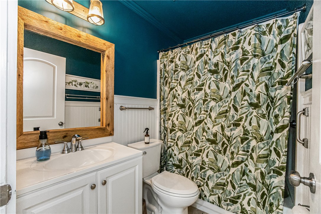 762 Bayharbor Terrace Sebastian, FL 32958 - Photo 14 of 24 a bathroom with a sink toilet and shower