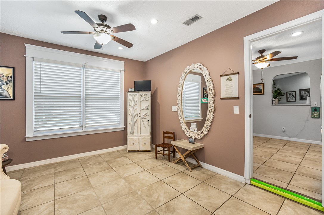 762 Bayharbor Terrace Sebastian, FL 32958 - Photo 15 of 24 a view of a livingroom with furniture and a chandelier