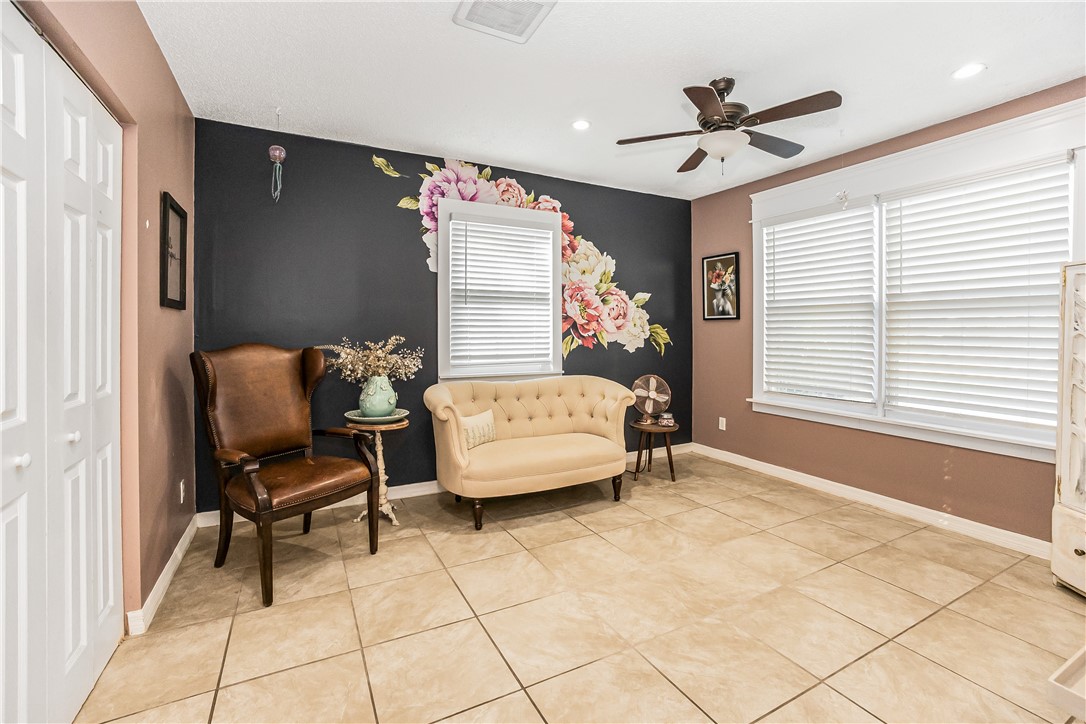 762 Bayharbor Terrace Sebastian, FL 32958 - Photo 16 of 24 a living room with furniture and a window