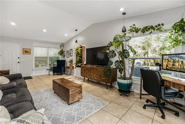 a view of a kitchen with a sink and cabinets