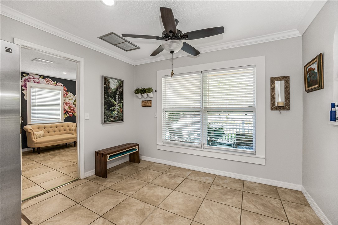 762 Bayharbor Terrace Sebastian, FL 32958 - Photo 21 of 24 a living room with furniture and a window