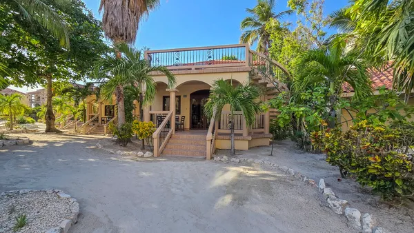 a view of a pathway with a building in the background