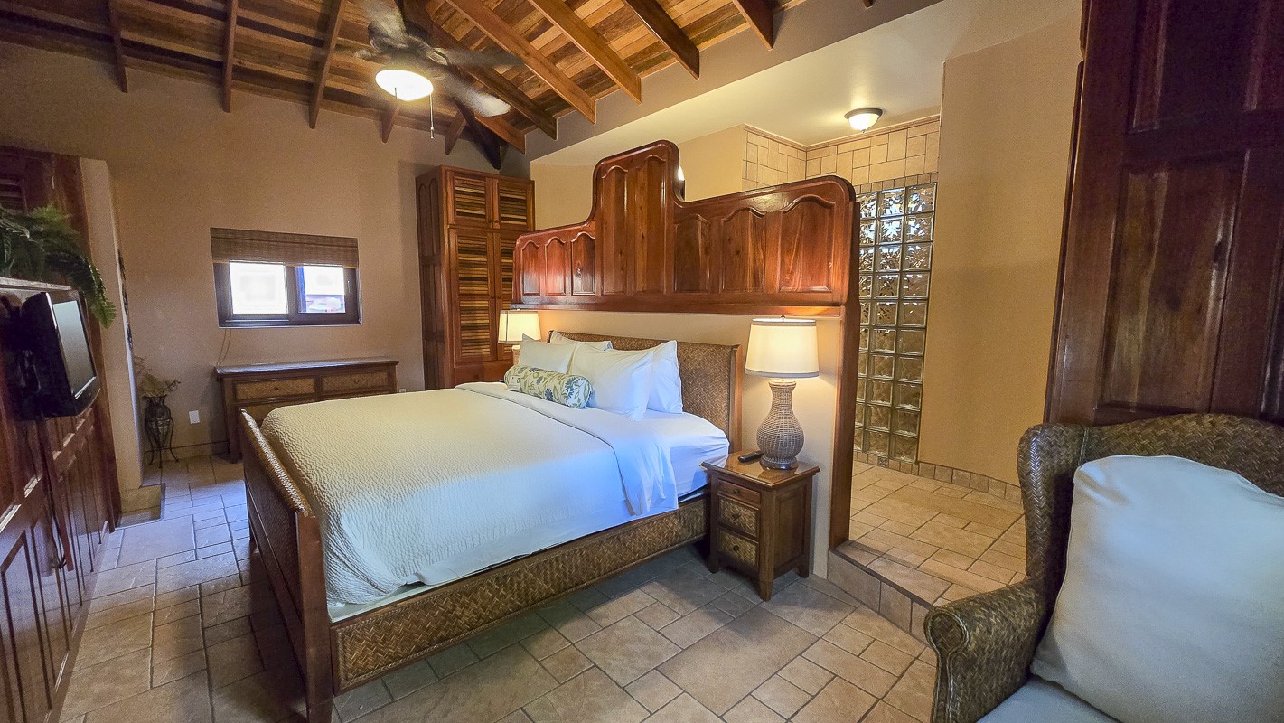 1.3 Miles North San Pedro, Unit CASITA1 Robstown, TX 78380 - Photo 11 of 37 a bed sitting in a room next to a window