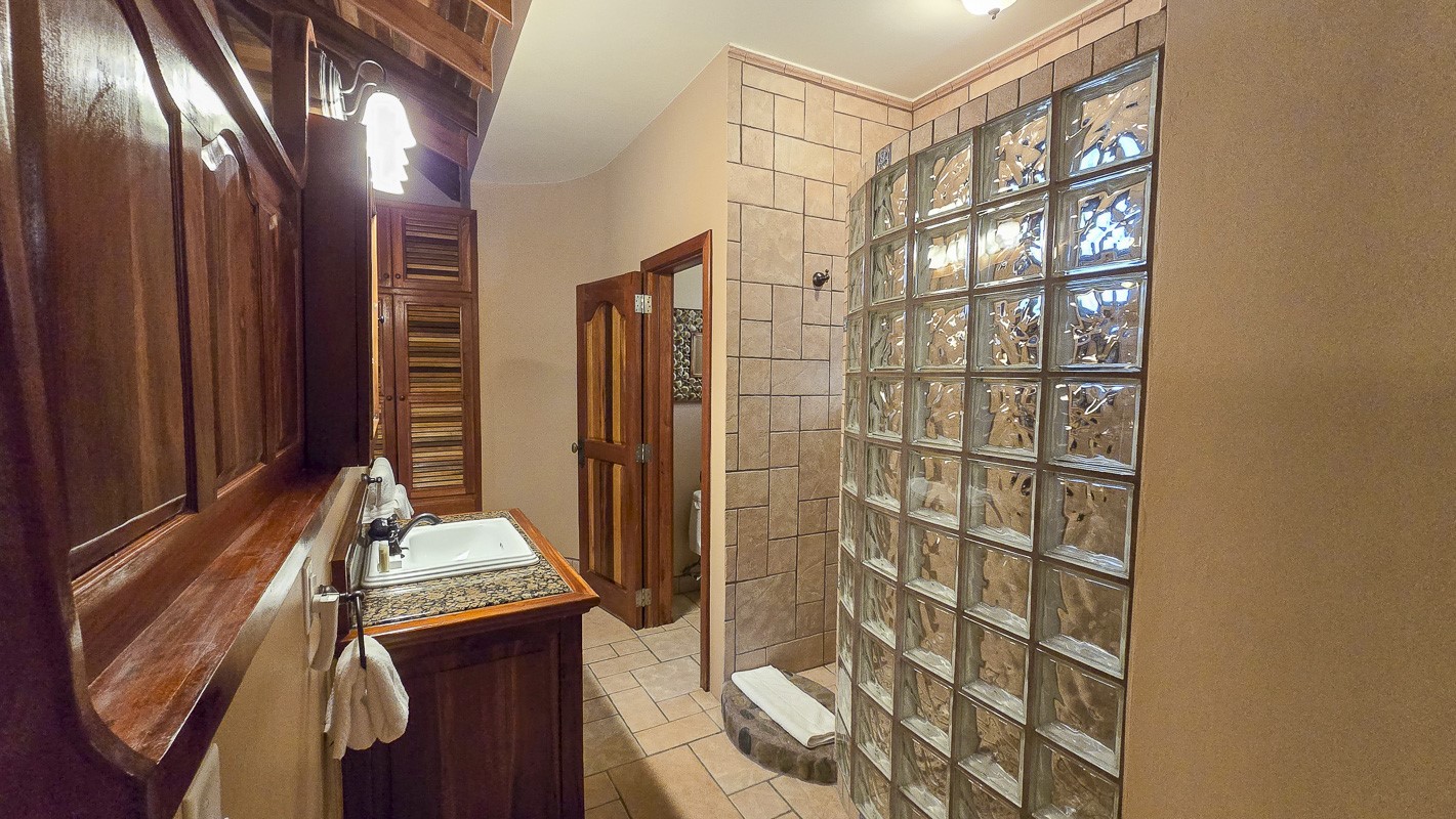 1.3 Miles North San Pedro, Unit CASITA1 Robstown, TX 78380 - Photo 16 of 37 a view of a hallway with paintings on the wall