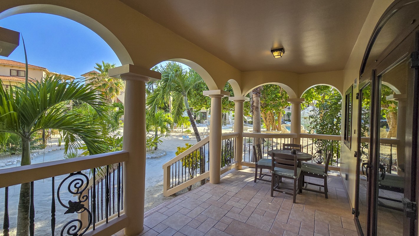 1.3 Miles North San Pedro, Unit CASITA1 Robstown, TX 78380 - Photo 17 of 37 a view of a chairs and table in patio with potted plants