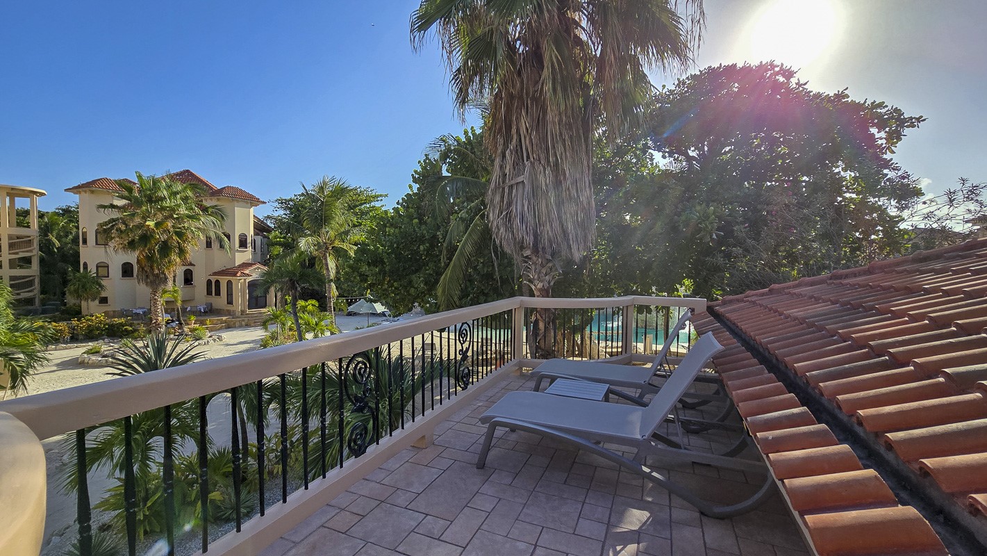 1.3 Miles North San Pedro, Unit CASITA1 Robstown, TX 78380 - Photo 19 of 37 a view of a balcony with wooden floor and fence