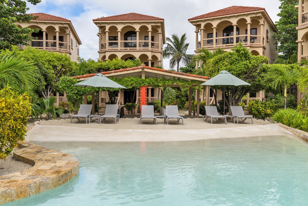 1.3 Miles North San Pedro, Unit CASITA1 Robstown, TX 78380 - Photo 28 of 37 a couple of table and chairs under an umbrella
