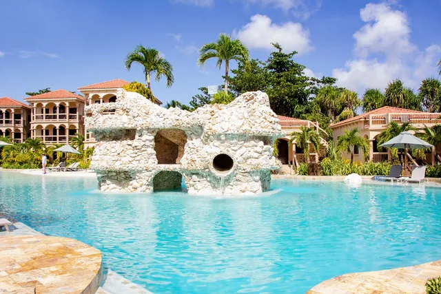 a view of swimming pool with a yard