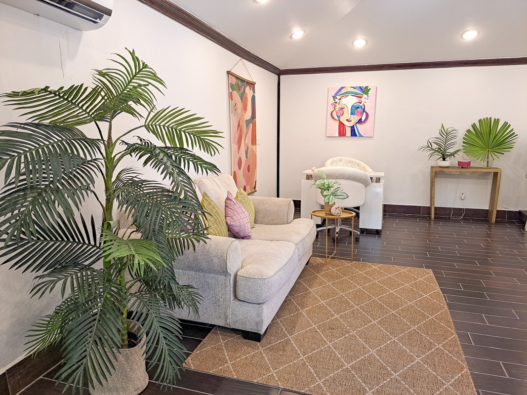 1.3 Miles North San Pedro, Unit CASITA1 Robstown, TX 78380 - Photo 33 of 37 a living room with furniture and a potted plant