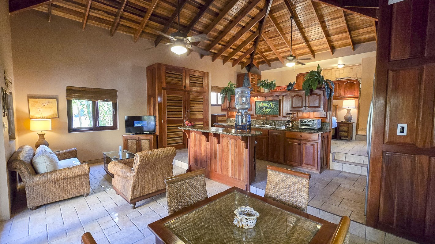 1.3 Miles North San Pedro, Unit CASITA1 Robstown, TX 78380 - Photo 7 of 37 a living room with furniture and a kitchen view