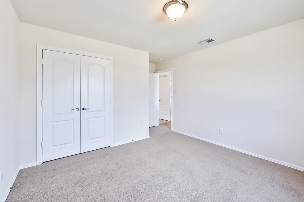 247 Sintra Lk Way Rosenberg, TX 77469 - Photo 24 of 28 a view of an empty room