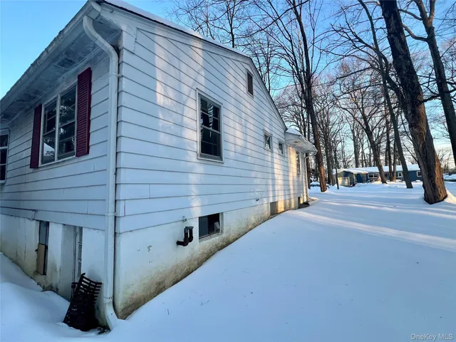 a view of road with large tree
