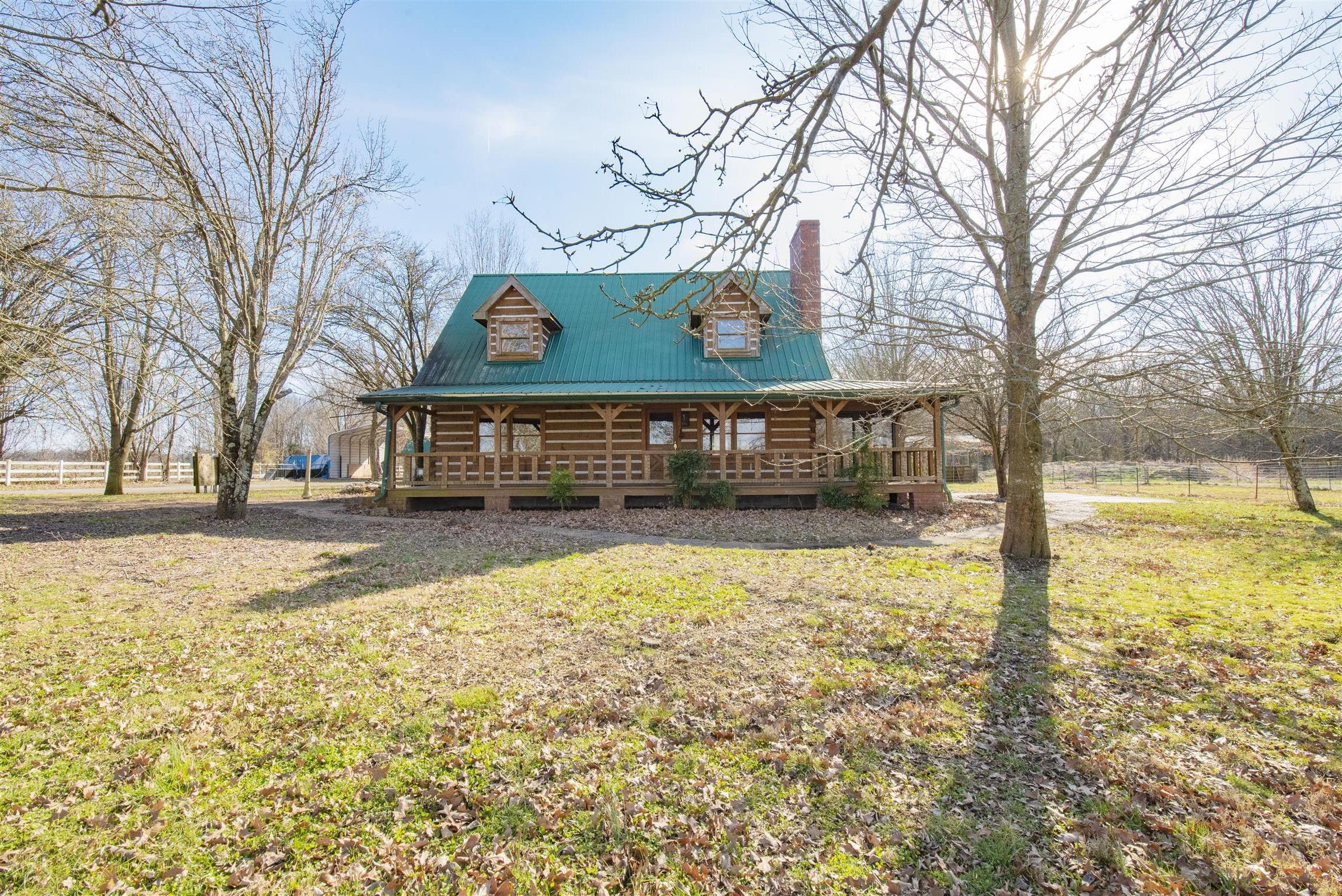4936 Sledge Road Christiana, TN 37037 - Photo 1 of 30 Front view of this amazing log home that is waiting for you to call home!