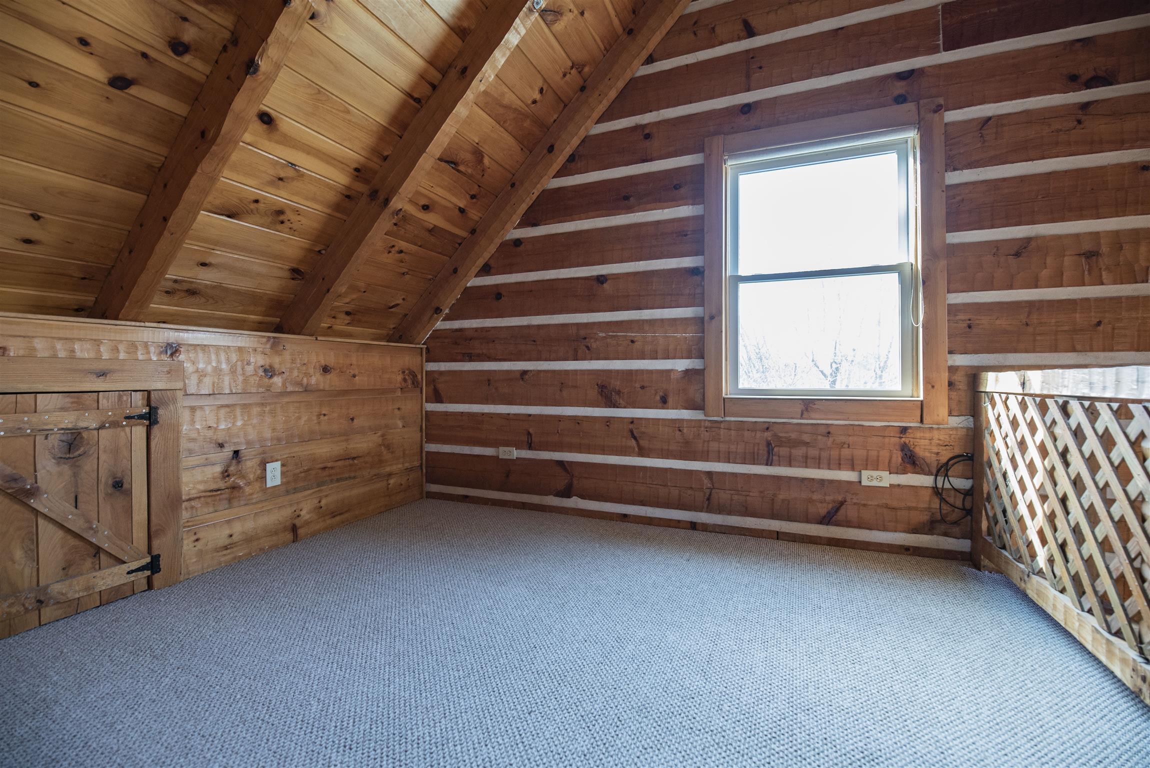 4936 Sledge Road Christiana, TN 37037 - Photo 14 of 30 Space at top of stairs overlooking living area. Would make a great study or sitting area. Small door to the left is giving access to additional storage.