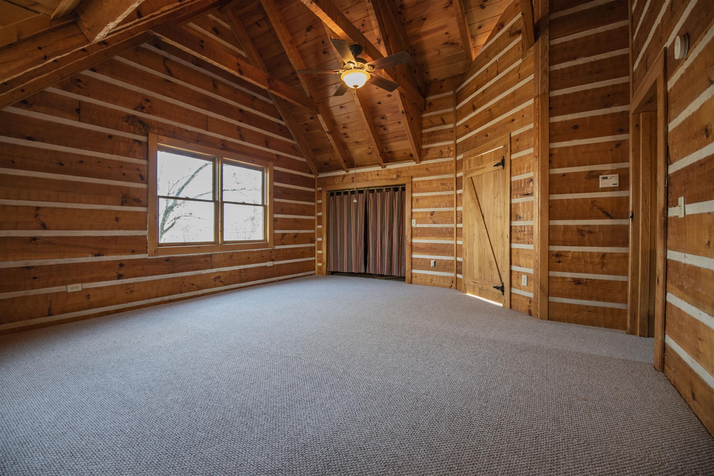 4936 Sledge Road Christiana, TN 37037 - Photo 15 of 30 Master bedroom with walk-in closet and awesome vaulted ceilings.