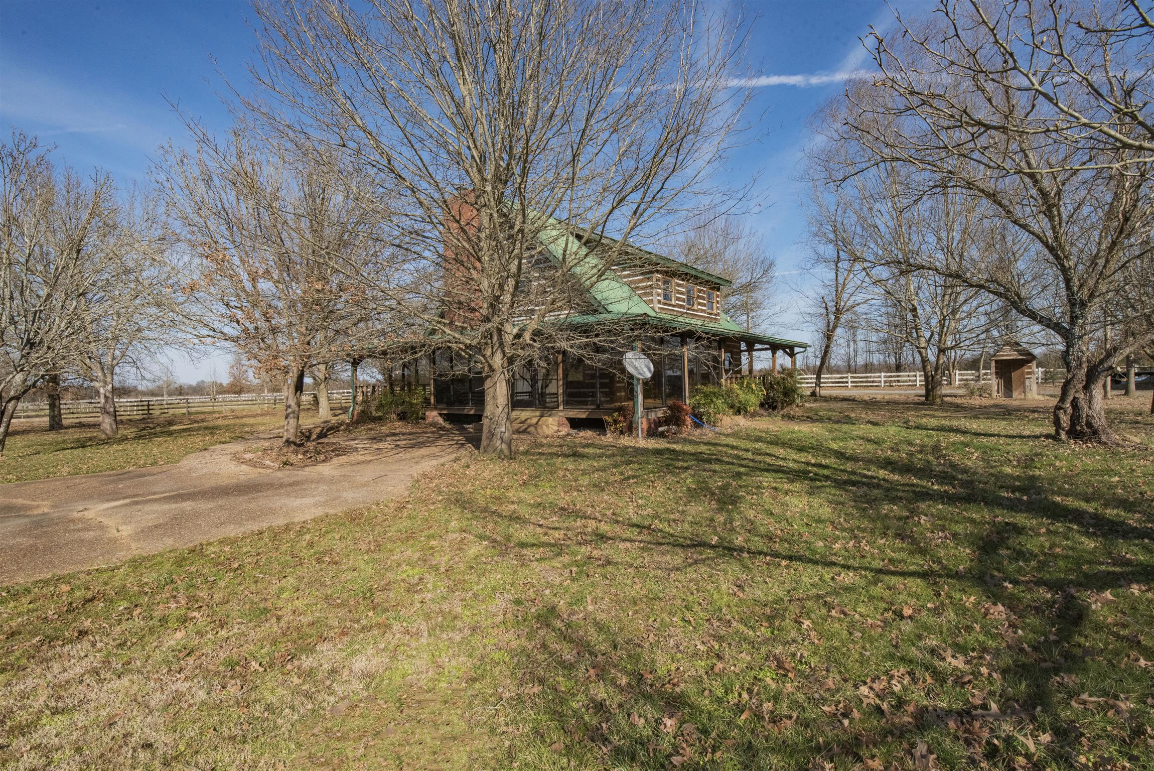 4936 Sledge Road Christiana, TN 37037 - Photo 23 of 30 View of the west end of the house featuring the patio area.
