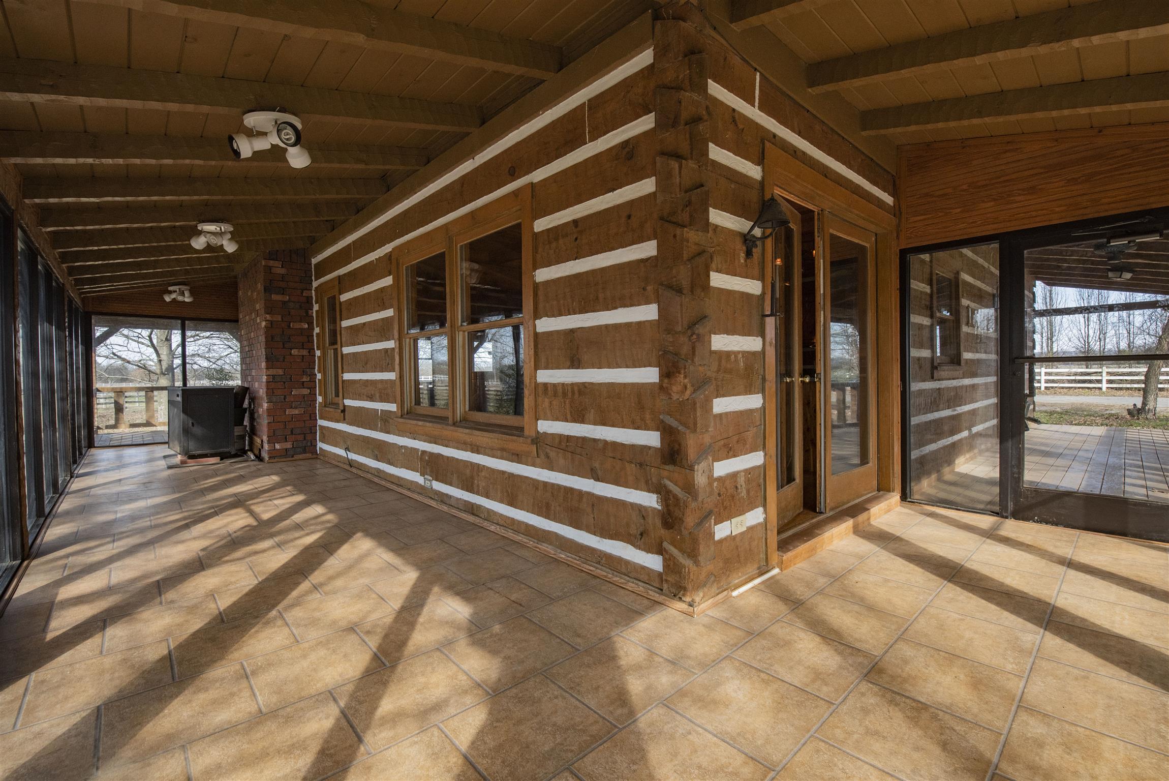 4936 Sledge Road Christiana, TN 37037 - Photo 25 of 30 View looking down both sides of the glassed in back porch.