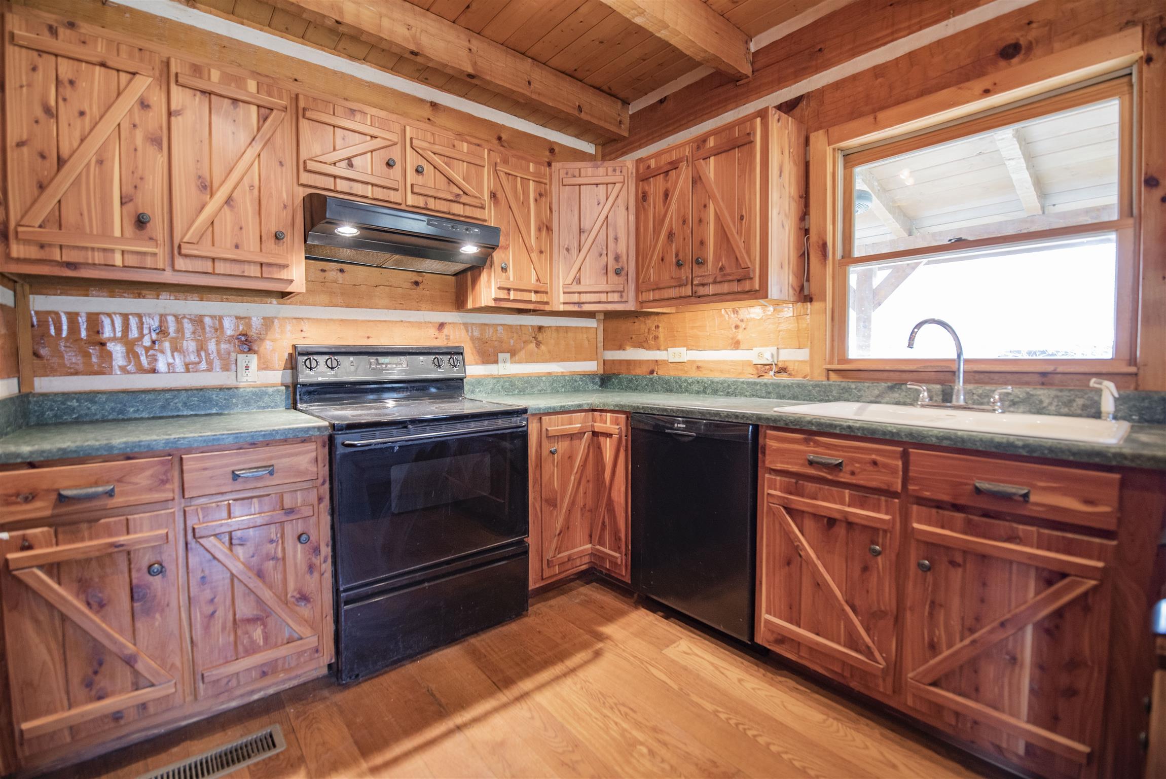 4936 Sledge Road Christiana, TN 37037 - Photo 8 of 30 Kitchen with beautiful natural wood cabinets. Plenty of storage in cabinets and kitchen pantry.