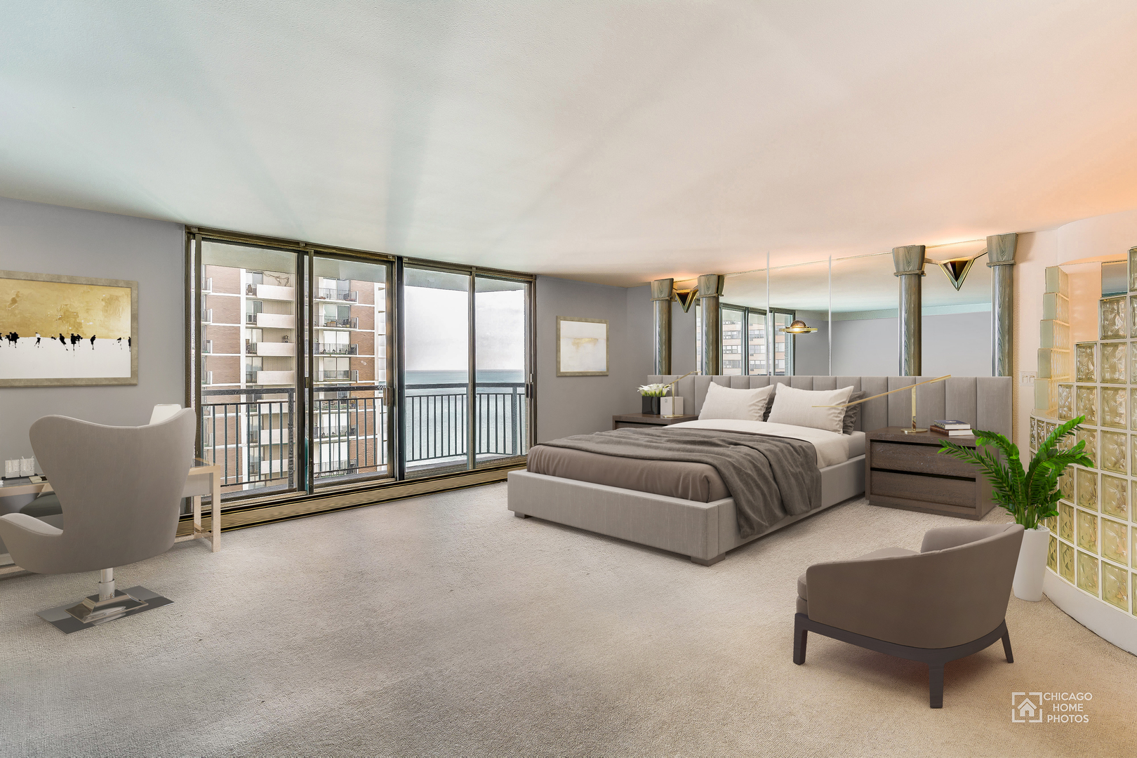 6007 North Sheridan Road, Unit 17DF Chicago, IL 60660 - Photo 9 of 20 a spacious bedroom with a bed and glass window