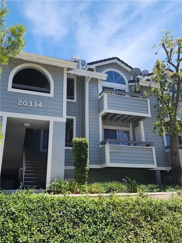 front view of a house with a small yard