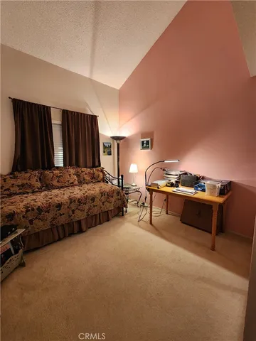 a workspace with furniture and window