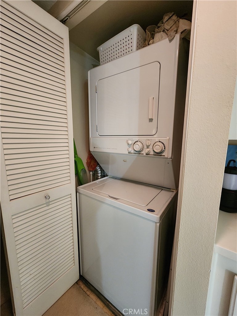 20334 Rue Crevier, Unit 622 Canyon Country, CA 91351 - Photo 21 of 22 a utility room with dryer and washer