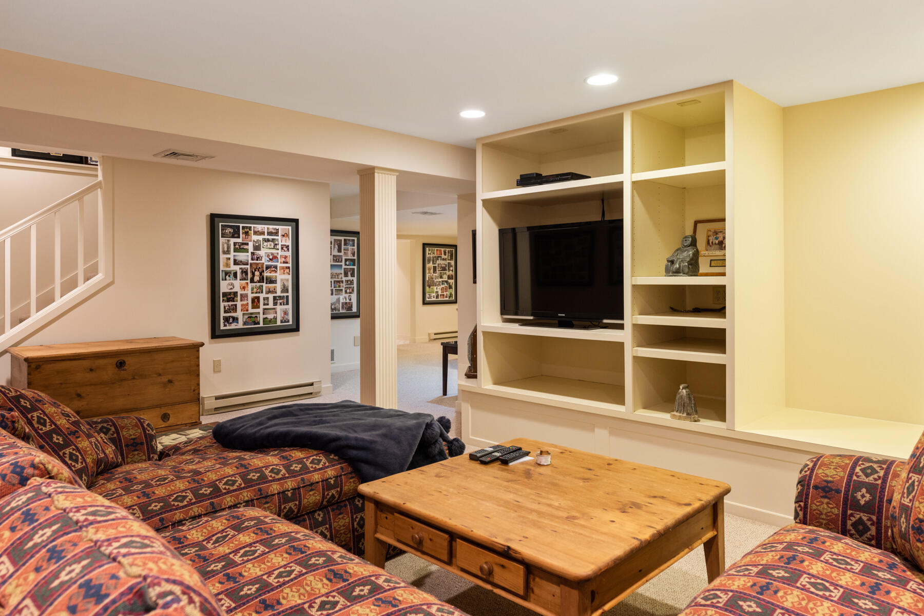 2 Open Space Drive Sandwich, MA 02563 - Photo 32 of 56 a living room with furniture and a flat screen tv