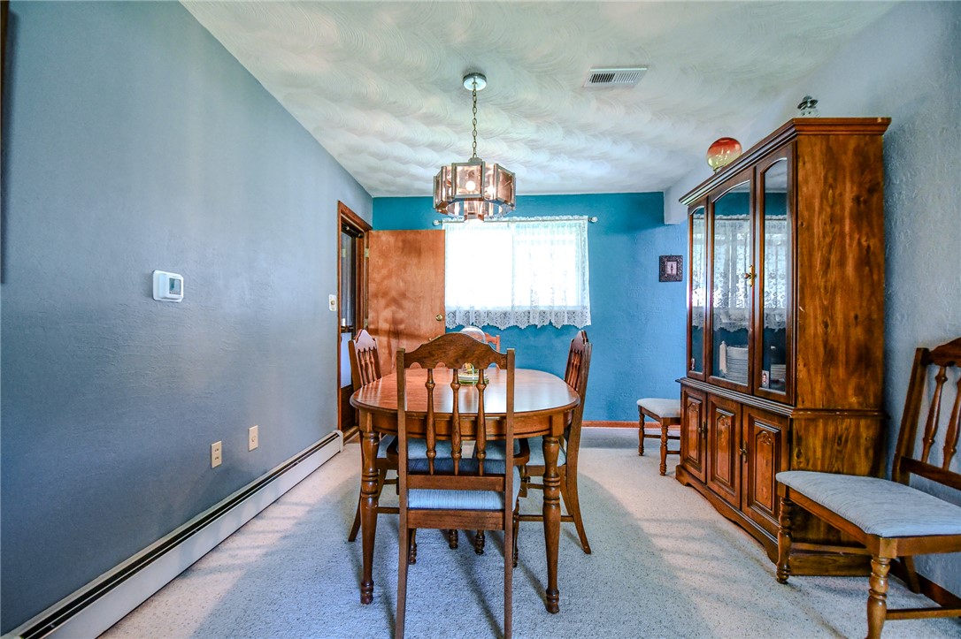 10833 Kendig Road Medway, OH 45341 - Photo 14 of 46 This dining area offers a cozy atmosphere for shared meals and gatherings.